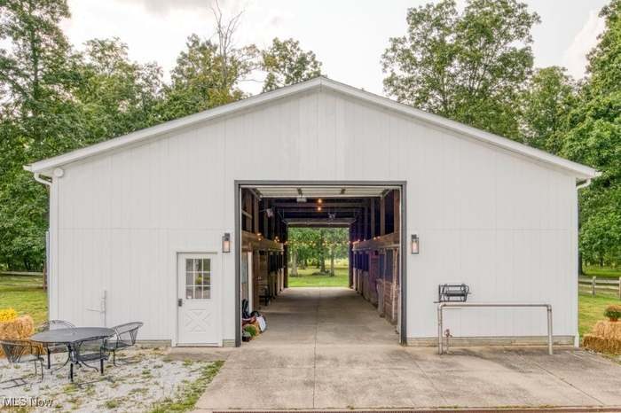 The white barn at Hickory Grove with its doors open